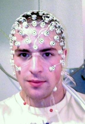 photo of a research study participant undergoing electroencephalography or EEG