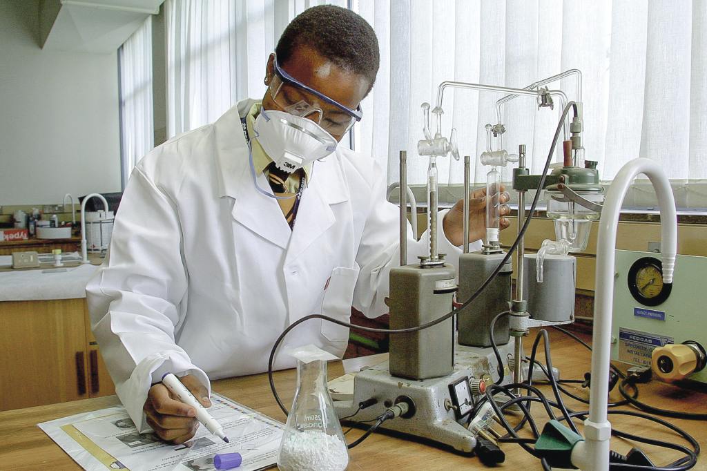 photo of man doing science in a laboratory