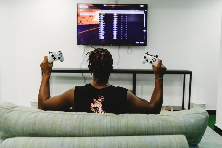 photo of man playing video games