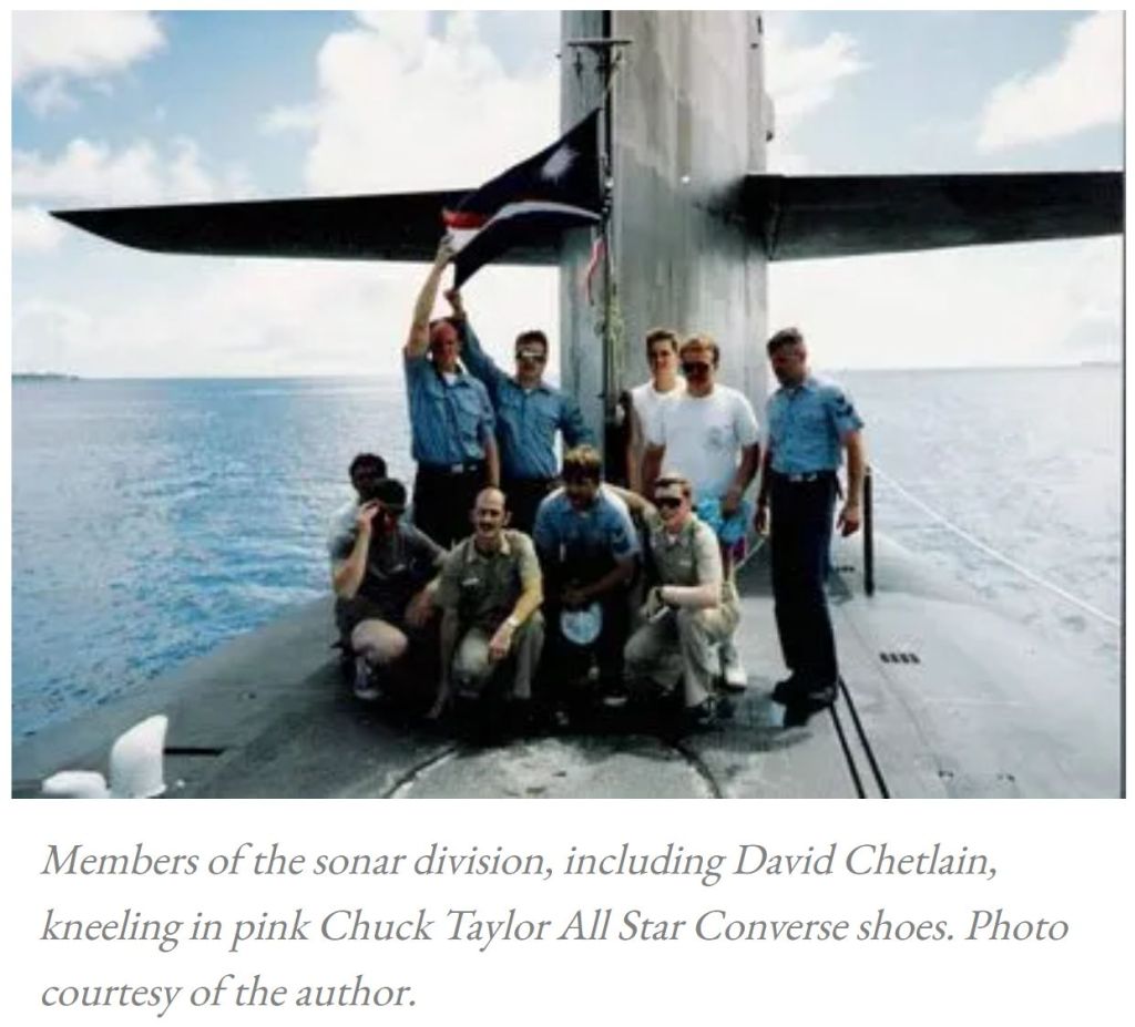 photo of members of the sonar division, including david chetlain, kneeling in pink chuck taylor all star converse shoes. photo courtesy of david chetlain.