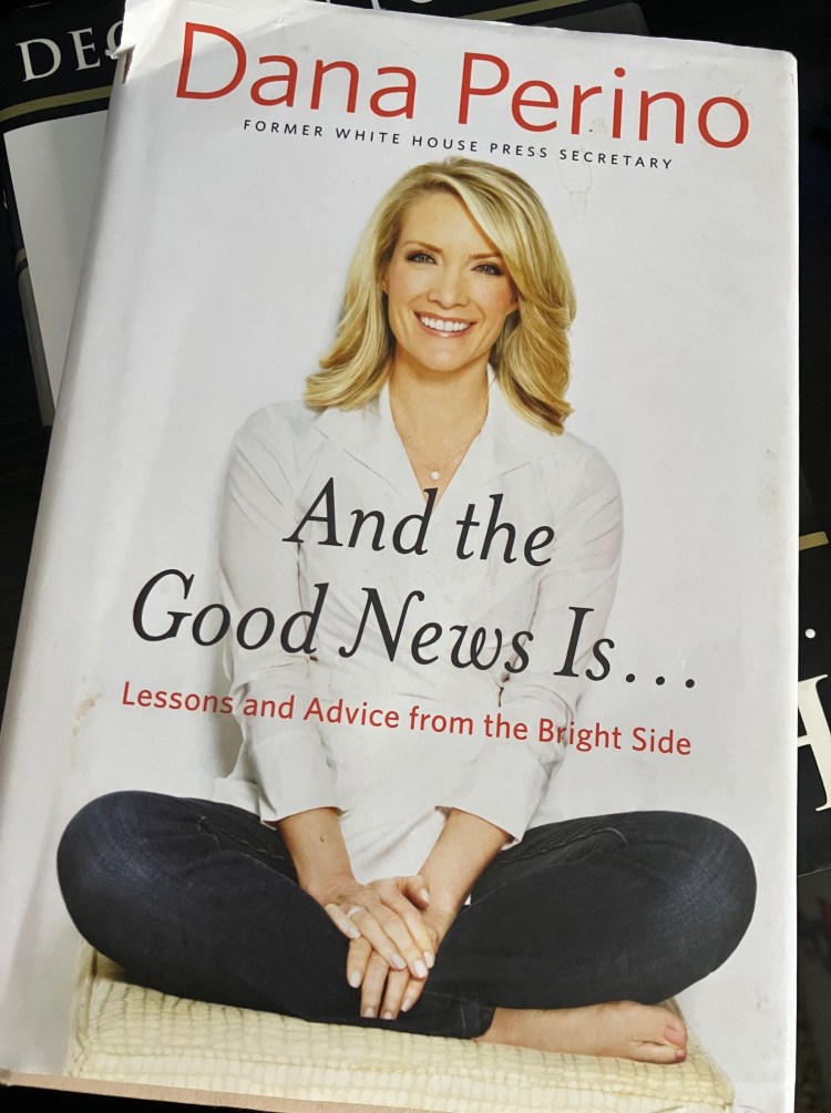 photo of a stack of books with "and the good news is" by dana perino on the top